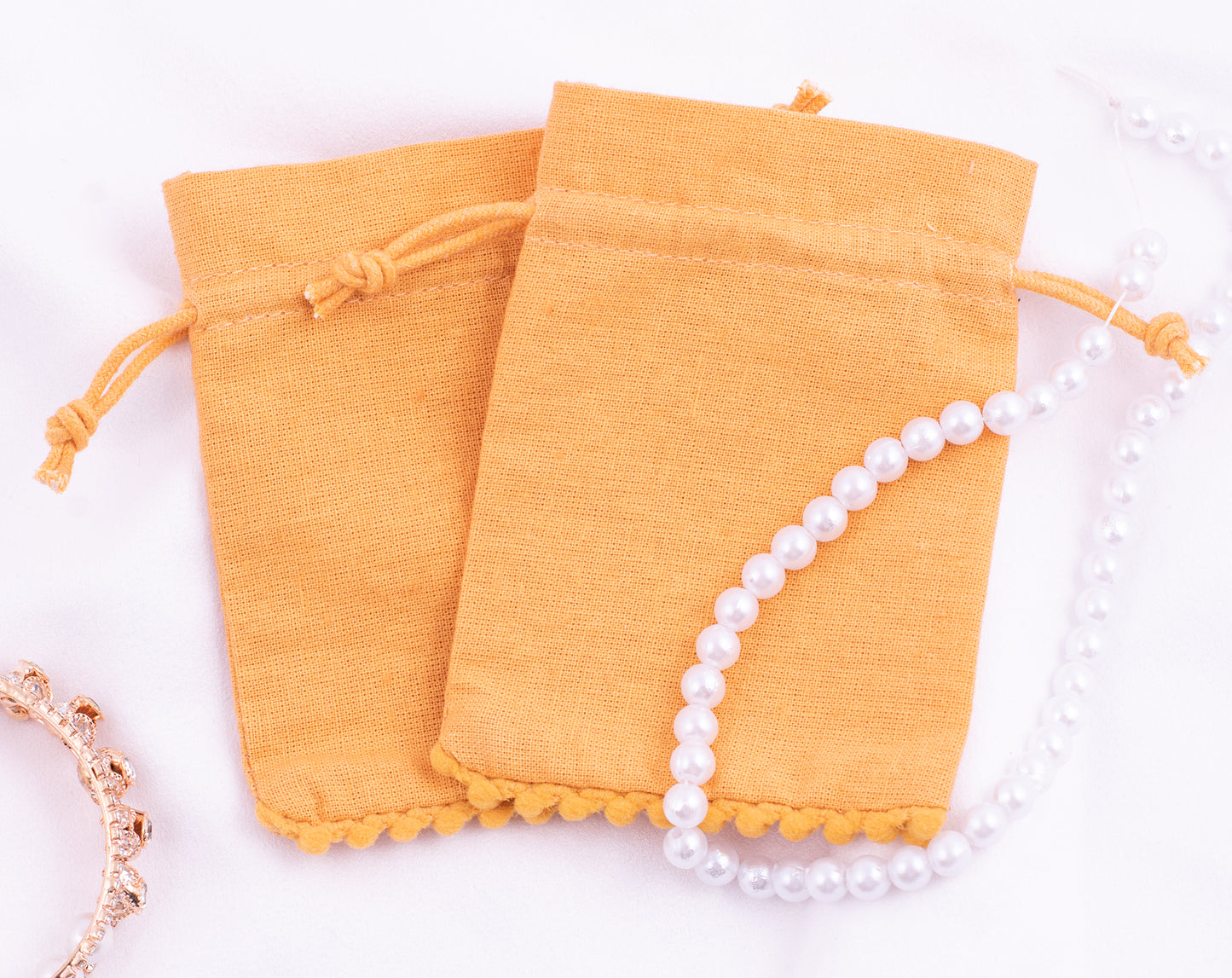 100pcs Yellow Gold Designer Cotton Pouches With Logo For Organic Jewelry Packaging