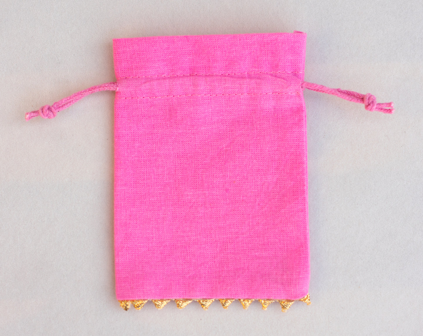 100pcs - Golden Lace Light Pink Designer Cotton Pouches With Logo