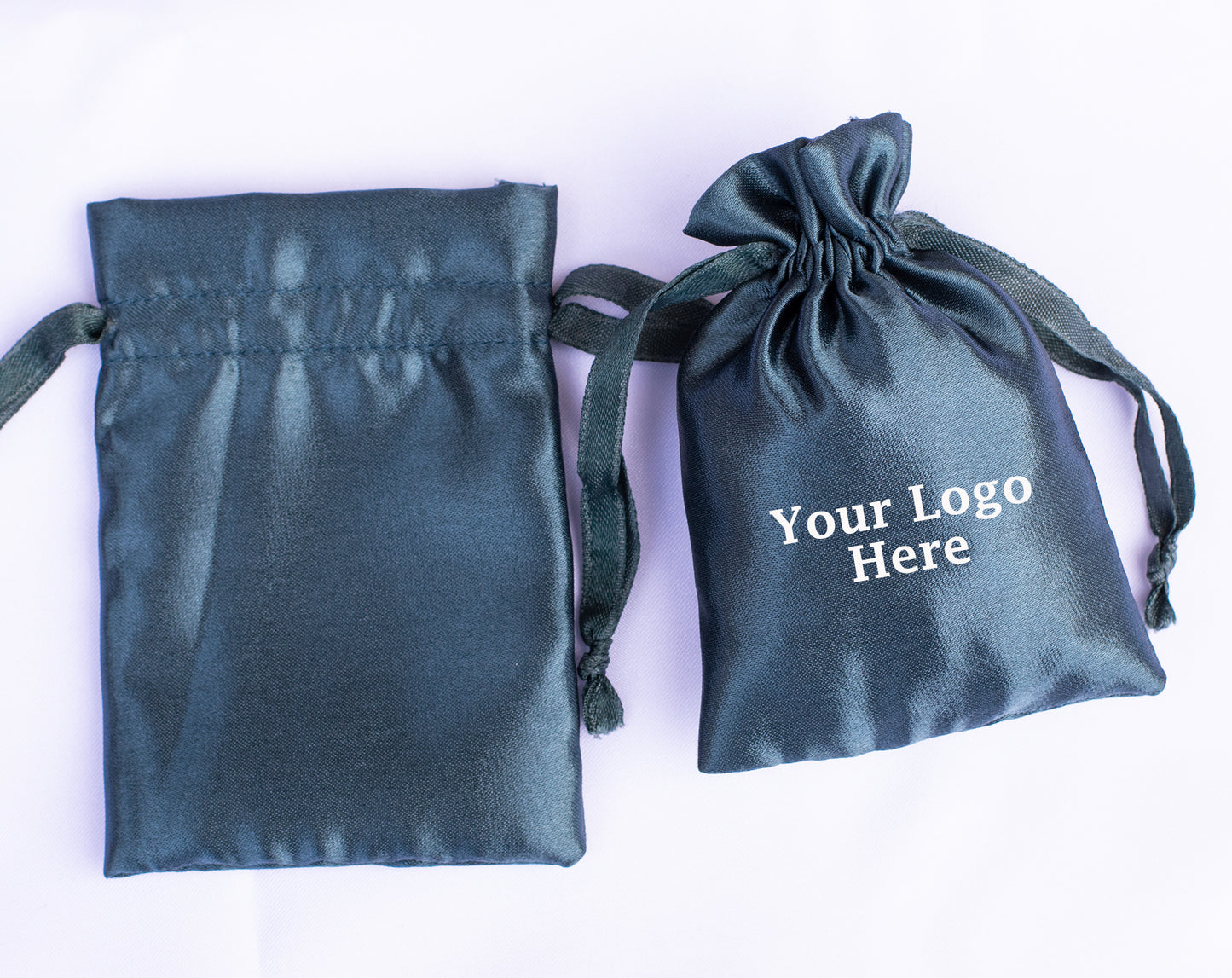 100pcs Bluish Satin Drawstring Pouch With Logo in Wholesale, Premium Jewelry Packaging