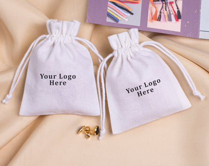 100pcs - White Cotton Drawstring Jewelry Pouch With Logo in Wholesale & Bulk