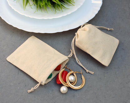 100pcs - Off-White Cotton Drawstring Jewelry Pouch With Logo in Wholesale & Bulk