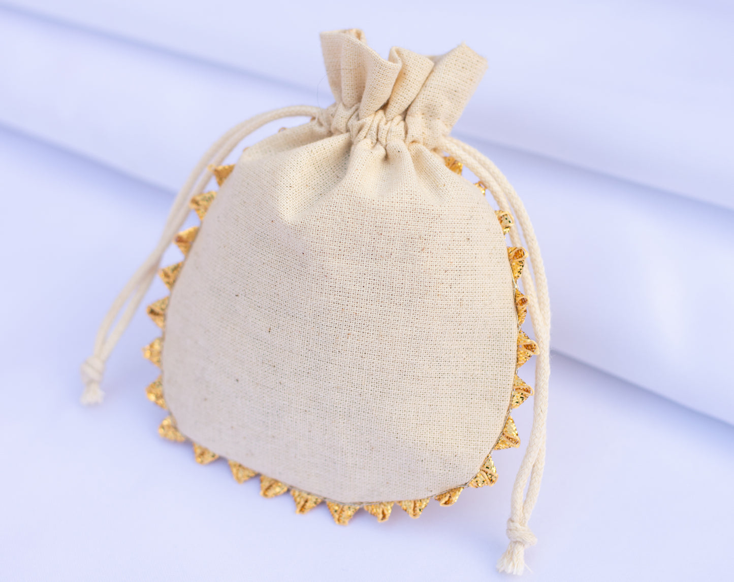 Pack of 100 - Round Golden Lace Ivory Drawstring Designer Pouch With Logo