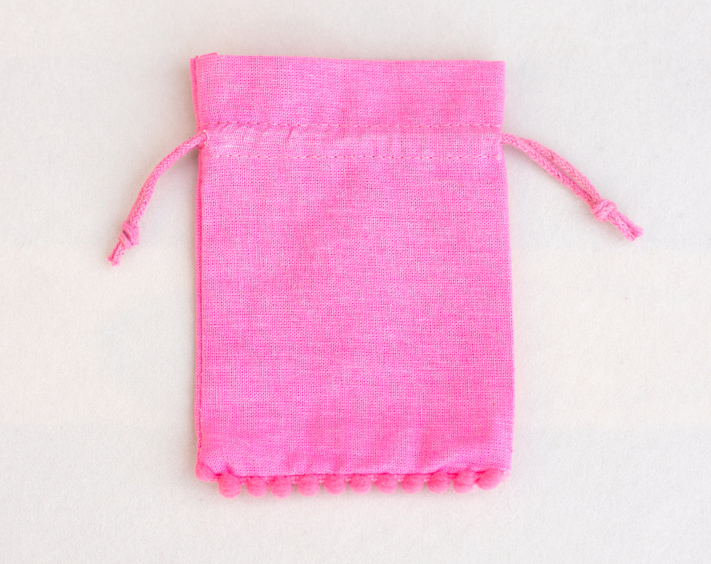 100pcs Light Pink Designer Cotton Drawstring Pouch With Logo, Eco Friendly Packaging