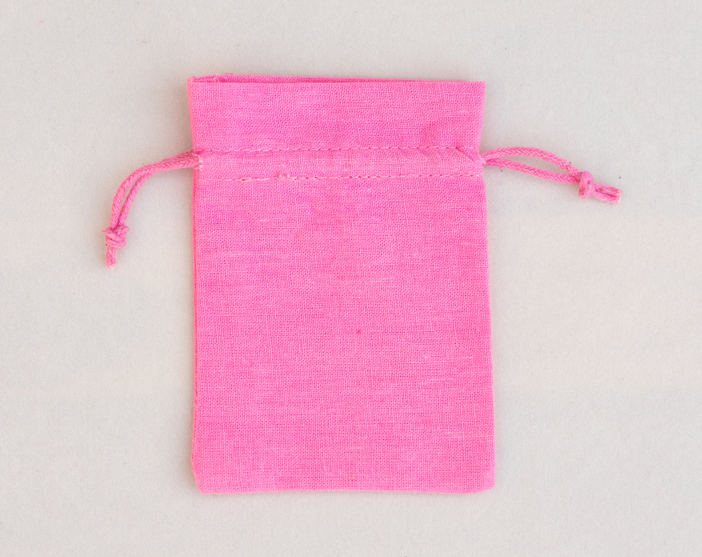 100pcs - Light Pink Cotton Drawstring Jewelry Pouch With Logo in Wholesale & Bulk