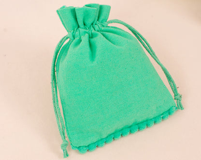100pcs Sea Green Designer Cotton Drawstring Pouch With Logo in Wholesale