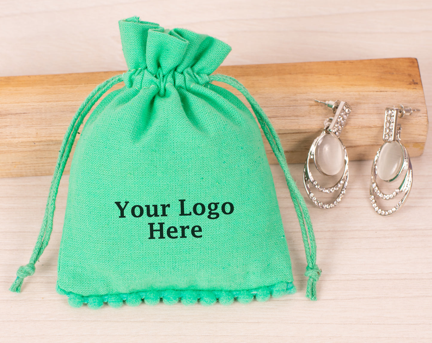 100pcs Sea Green Designer Cotton Drawstring Pouch With Logo in Wholesale
