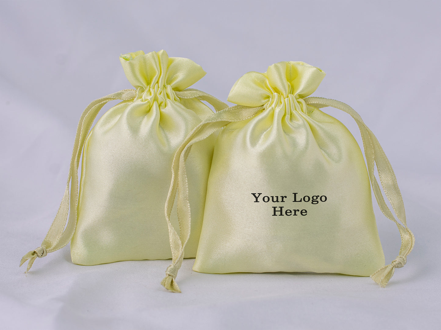 Pack of 100 - Lemon Satin Drawstring Jewelry Bags With Logo in Wholesale & Bulk